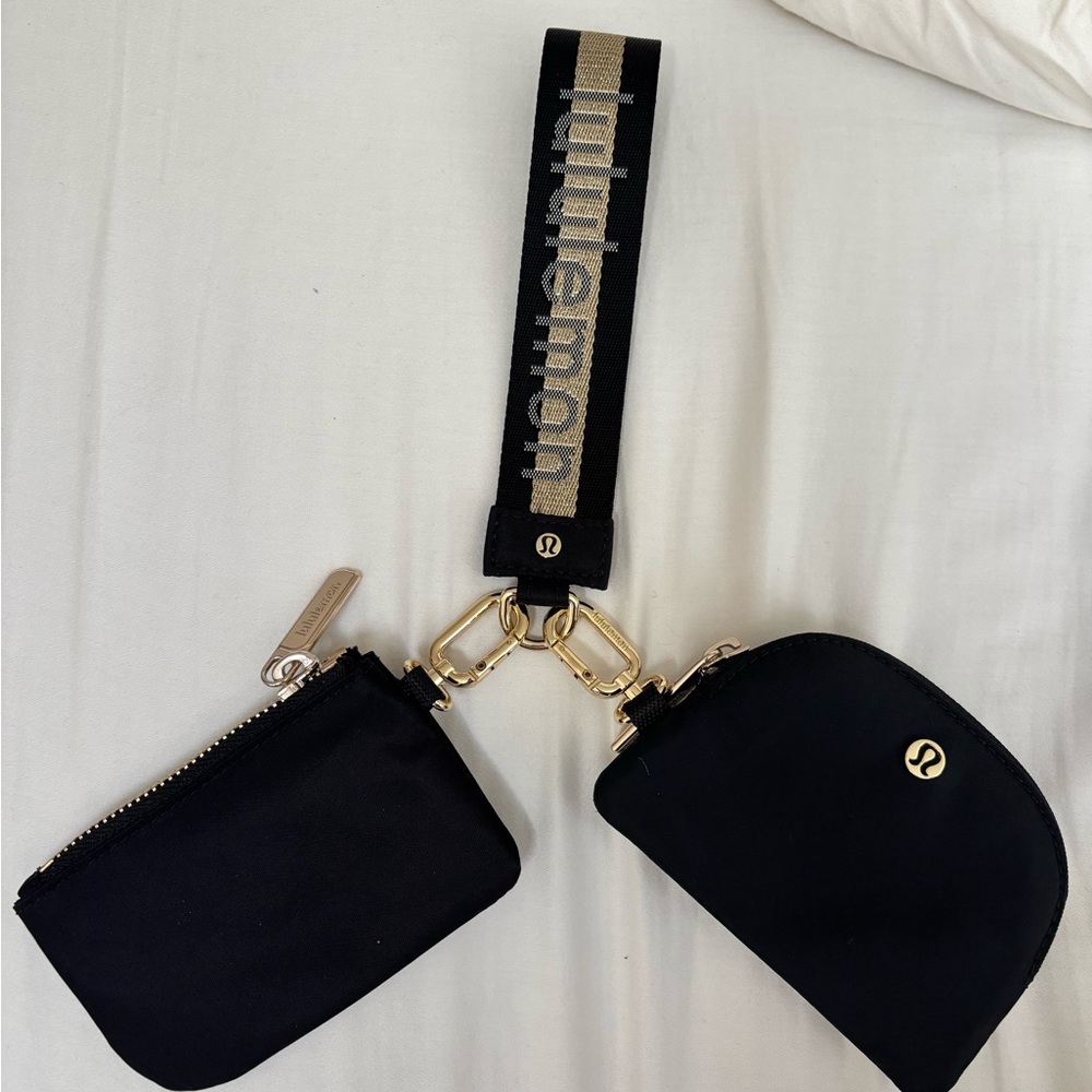 Lululemon Black Pouch Set with Gold Accents